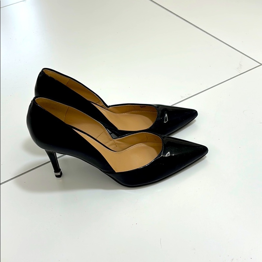 Michael Kors black patent pumps, size 6.mid heel